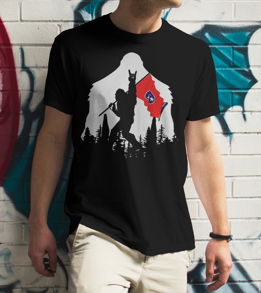 Bigfoot Silhouette With Rock And Roll Pose Holding Tennessee Flag In Forest T-Shirt