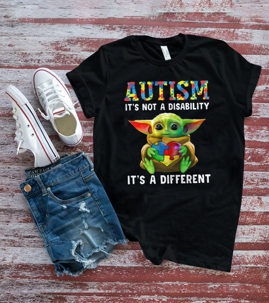 AUTISM IT'S NOT A DISABILITY IT'S A DIFFERENT Baby Yoda Holding Puzzle Piece T-Shirt