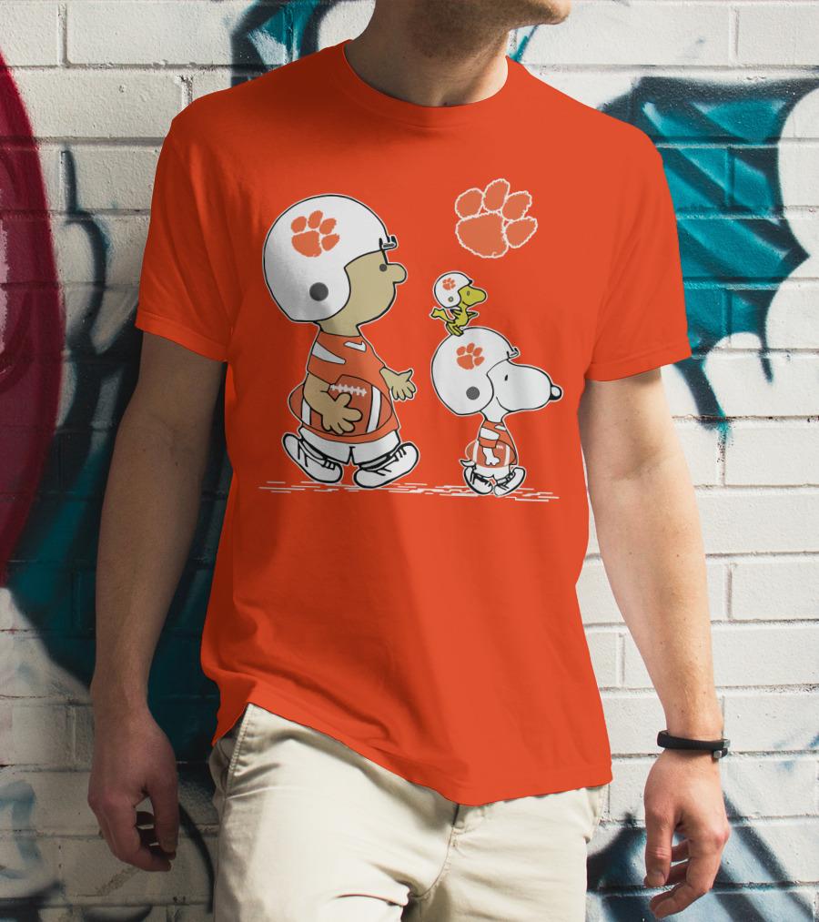Clemson Tigers Snoopy Football Helmets And Paw Print Charlie Brown Woodstock T-Shirt