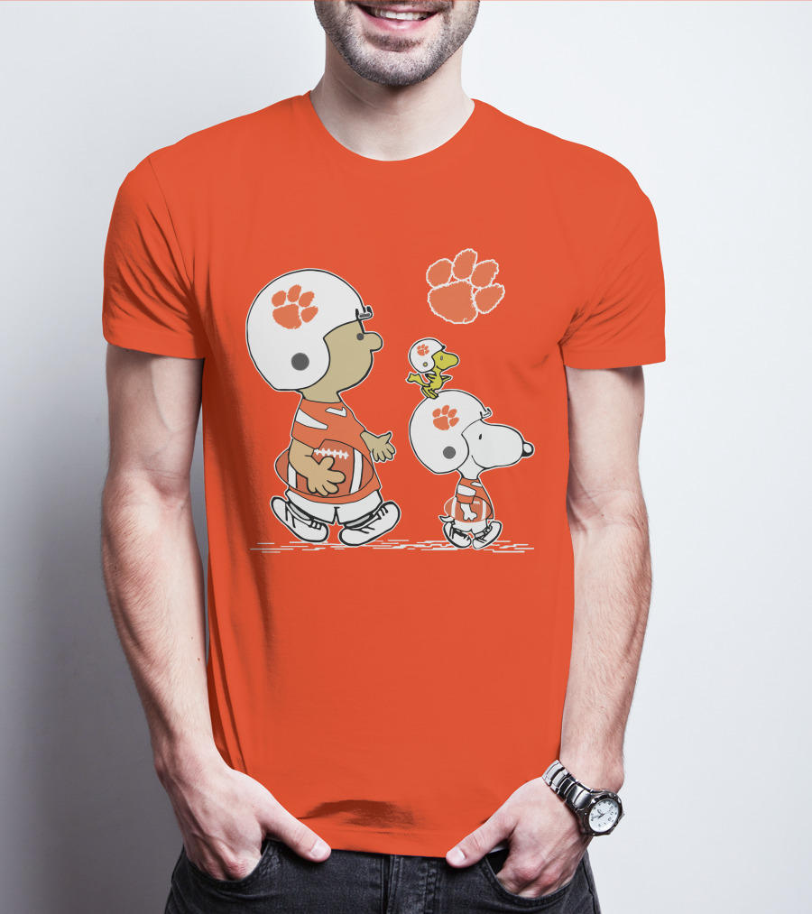 Clemson Tigers Snoopy Football Helmets And Paw Print Charlie Brown Woodstock T-Shirt