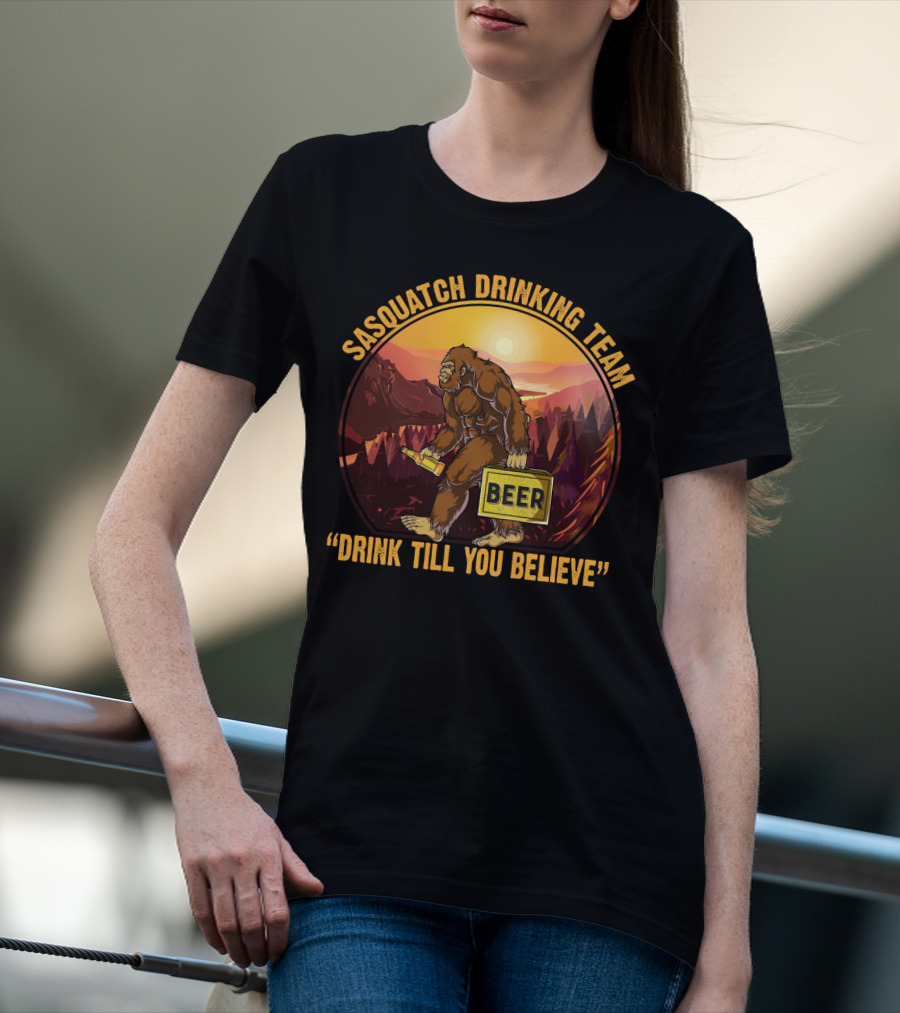 Sasquatch Drinking Team Beer Wilderness Sunset Funny Bigfoot Drink Till You Believe T-Shirt