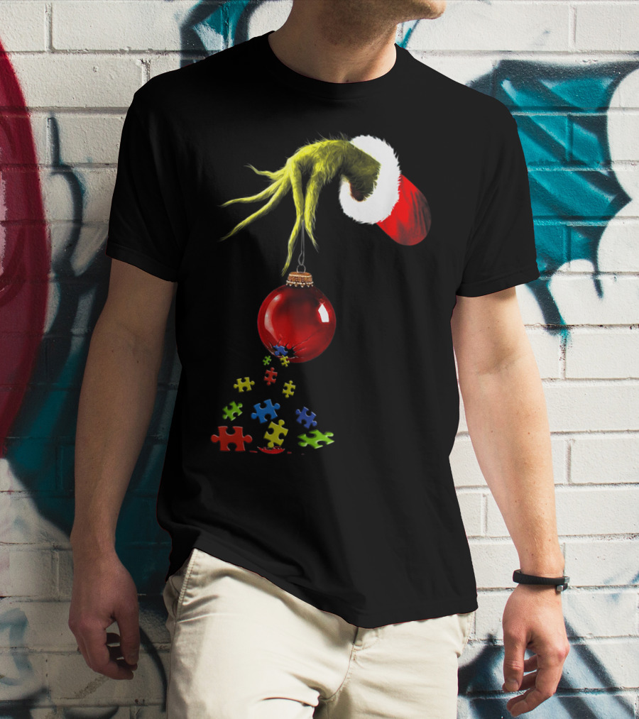 Grinch Hand Holding Red Ornament With Autism Puzzle Pieces T-Shirt