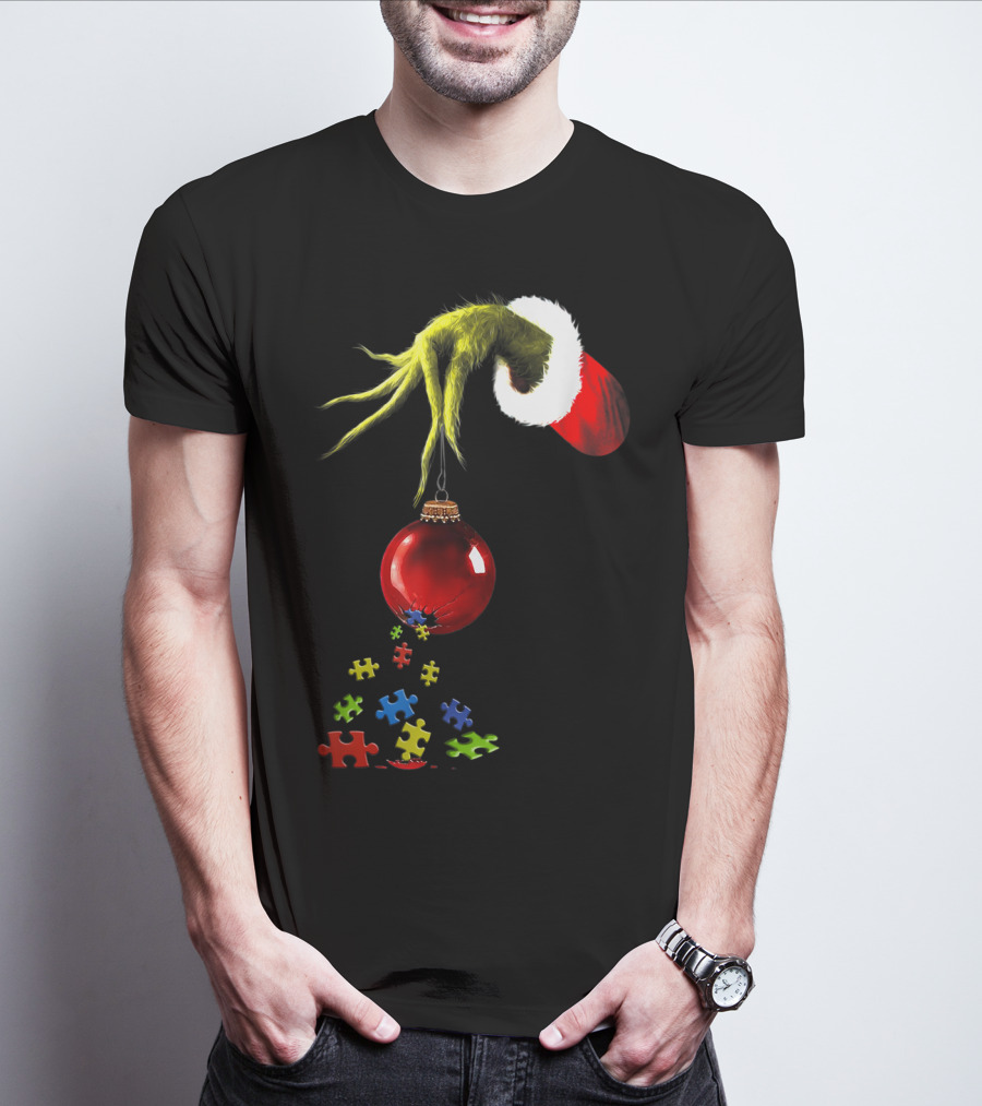 Grinch Hand Holding Red Ornament With Autism Puzzle Pieces T-Shirt
