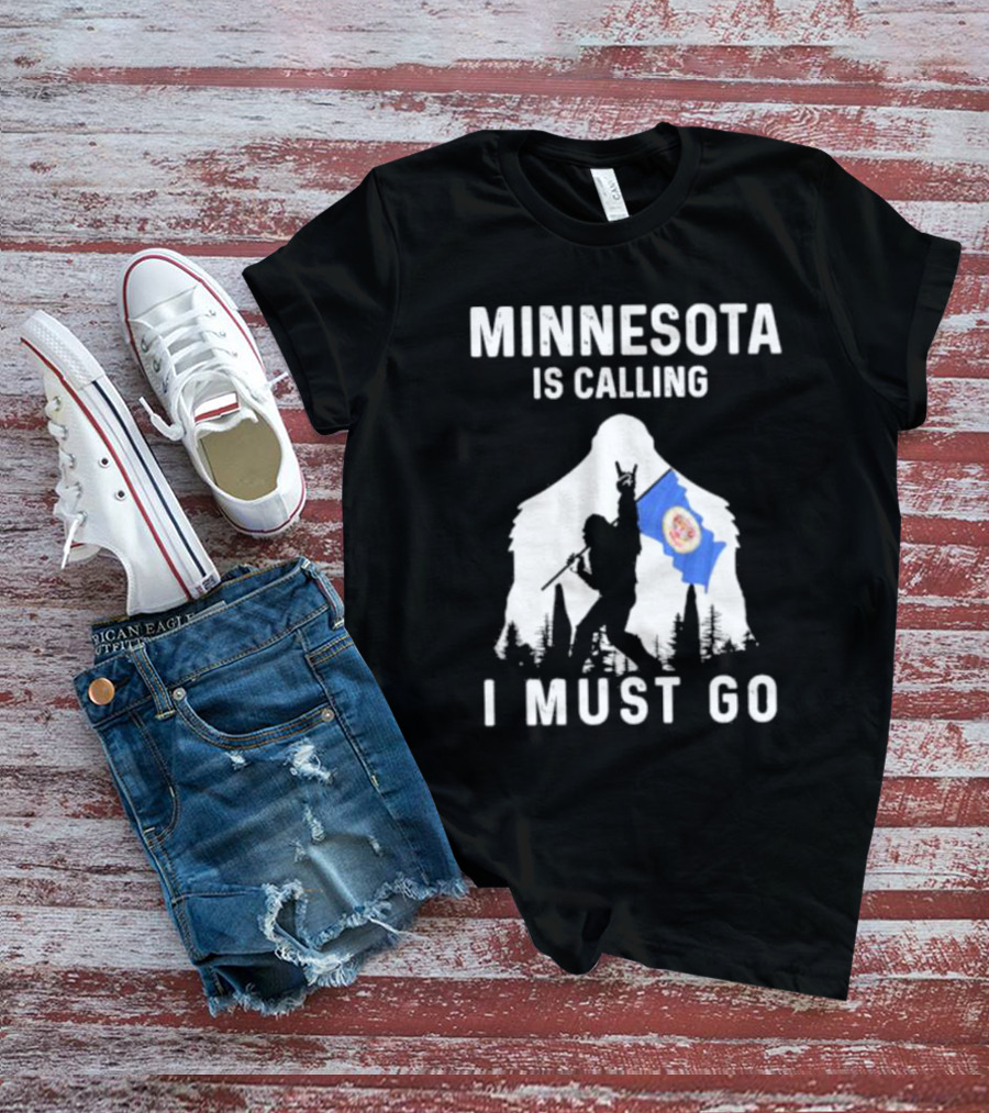 Minnesota Is Calling I Must Go Bigfoot Silhouette With Flag T-Shirt
