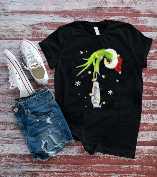 Grinch Christmas Hand Holding Clipper Snowflakes Santa Hat T-Shirt