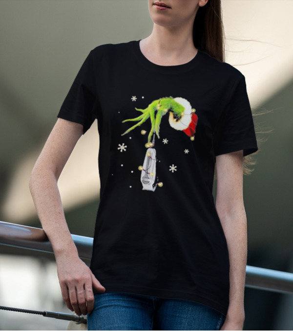 Grinch Christmas Hand Holding Clipper Snowflakes Santa Hat T-Shirt