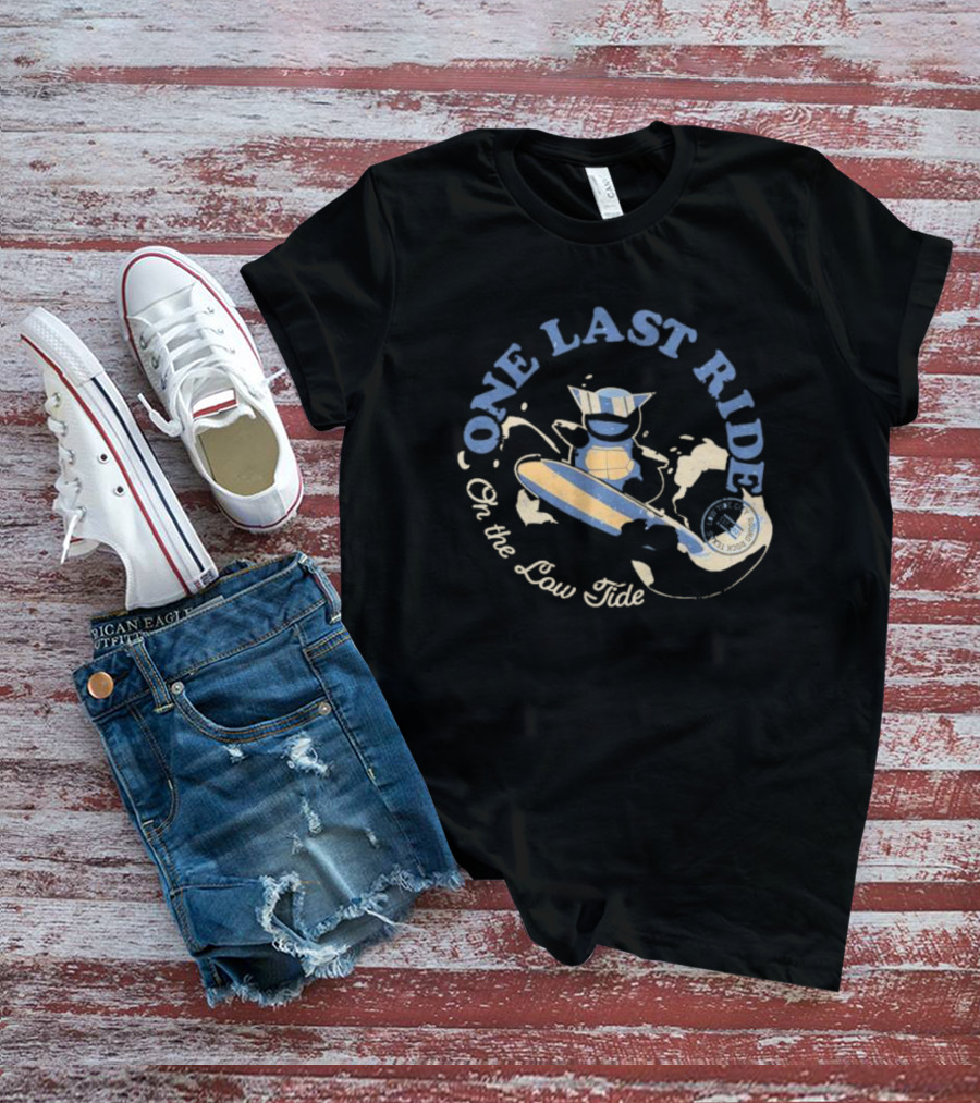 Surfing Adventure With Blue Masked Figure And Iconic Board 'One Last Ride On The Low Tide' T-Shirt