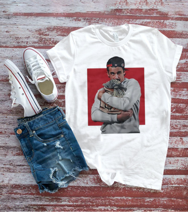 Seth Jarvis Holding Money Bag In Hockey Cap T-Shirt