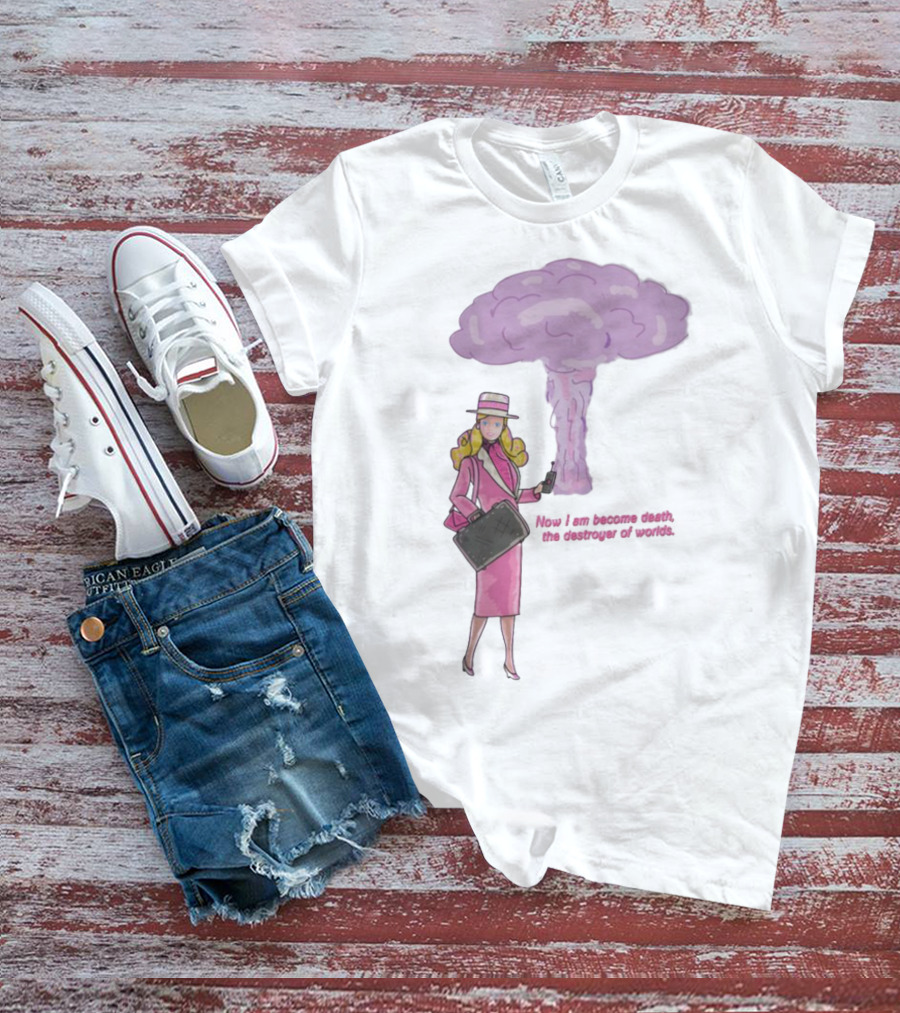 Now I Am Become Death The Destroyer Of Worlds Blonde Woman Pink Outfit Holding Bag Phone With Purple Mushroom Cloud T-Shirt