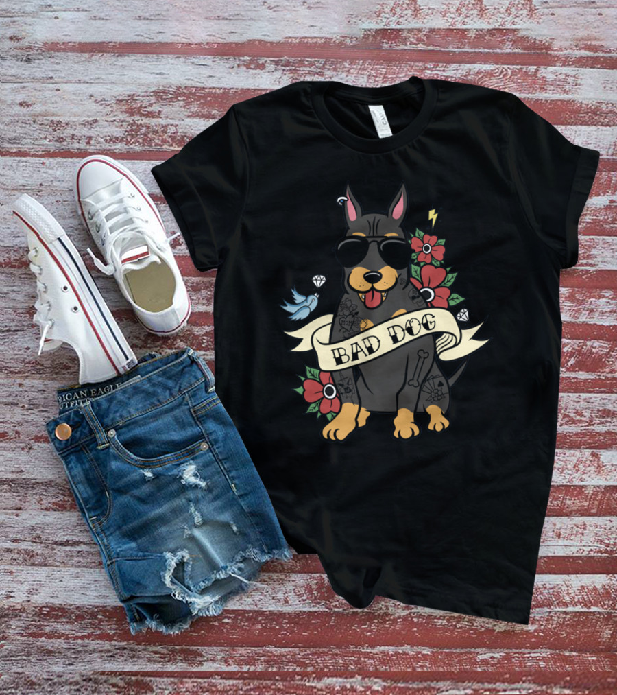 BAD DOG DOBERMAN WITH SUNGLASSES AND TATTOOS SURROUNDED BY FLOWERS AND BIRD ICONS T-Shirt