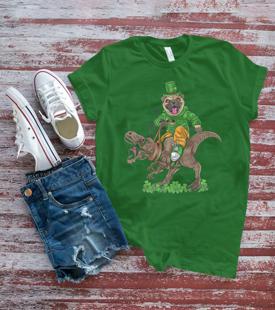 St Patricks Day Pug Puppy Riding Dinosaur Rex With Shamrocks And Leprechaun Hat T-Shirt