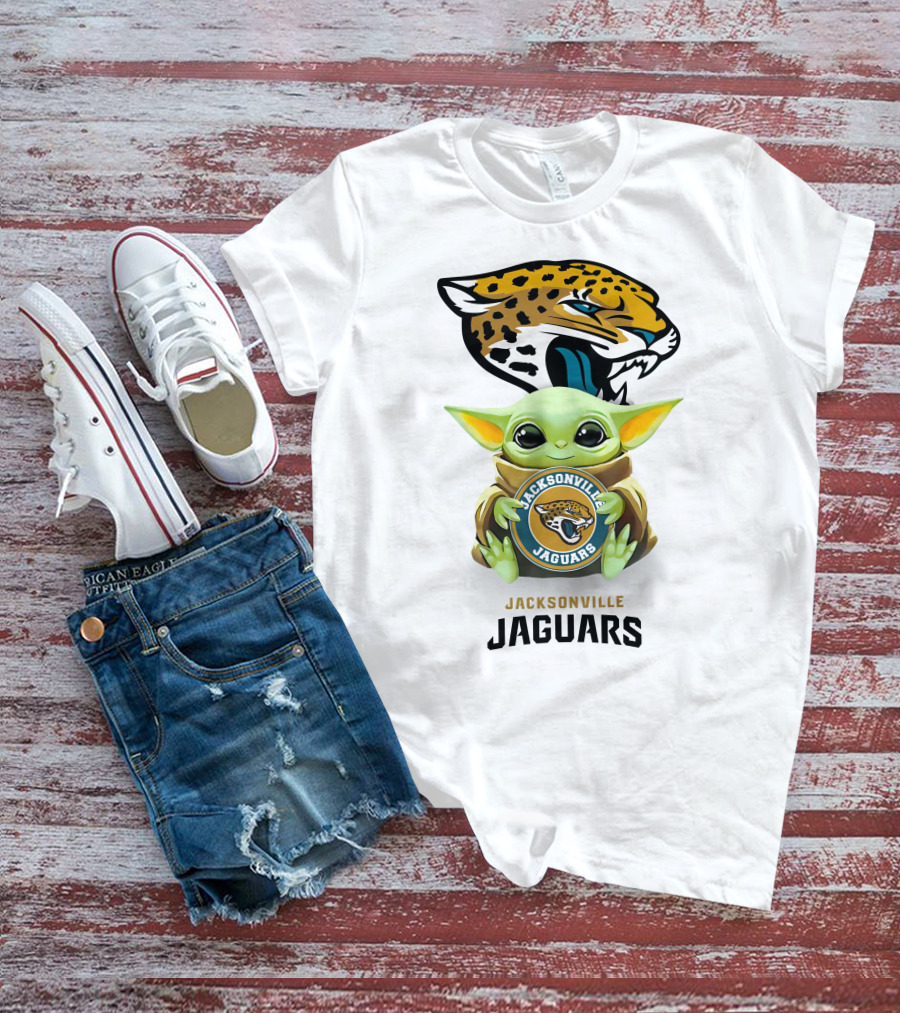 Grogu Holding Jacksonville Jaguars Badge With Mascot In Background T-Shirt