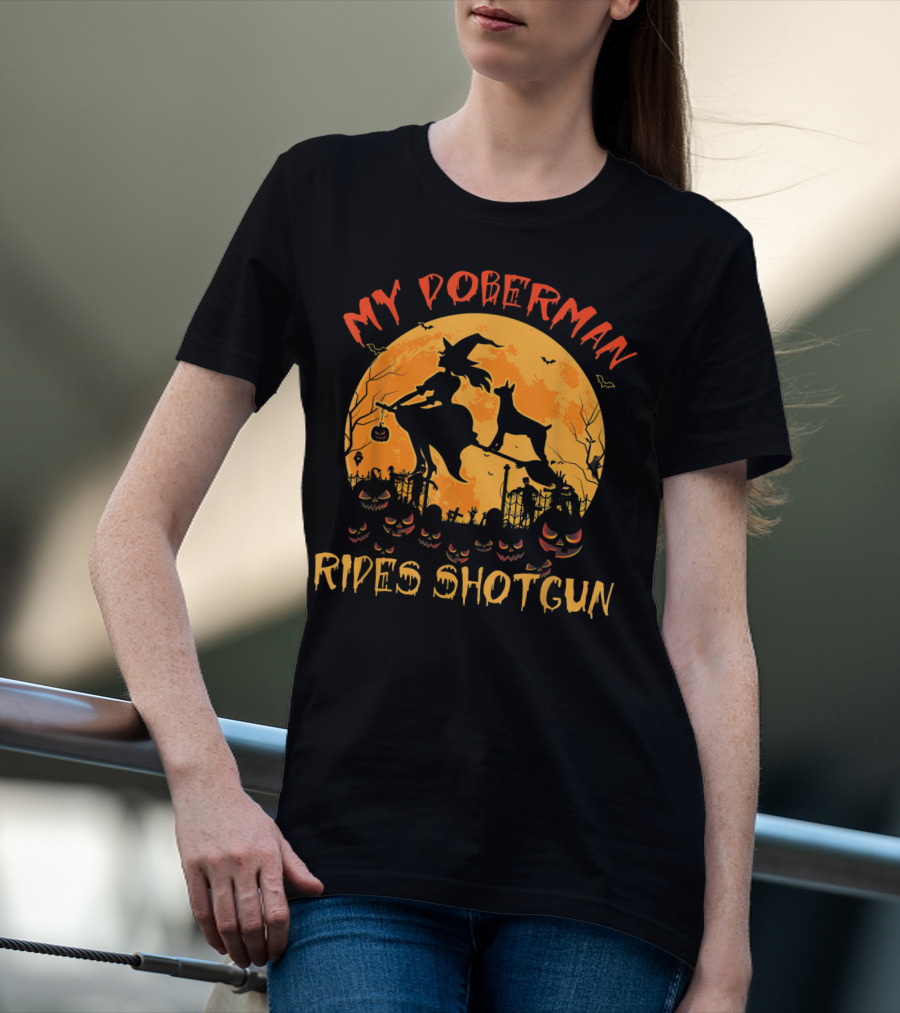 My Doberman Rides Shotgun Halloween Witch And Pumpkins Moon Scene T-Shirt