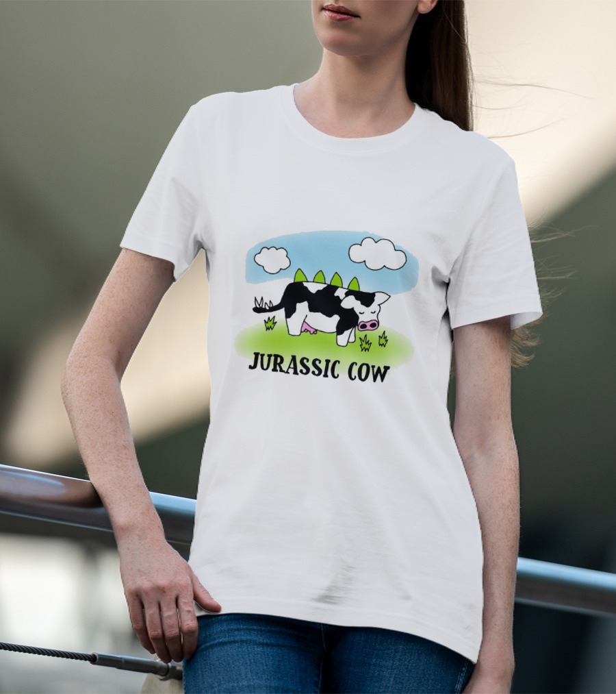 Jurassic Cow Grazing With Dinosaur Spikes Under Blue Sky And Clouds In Cartoon T-Shirt