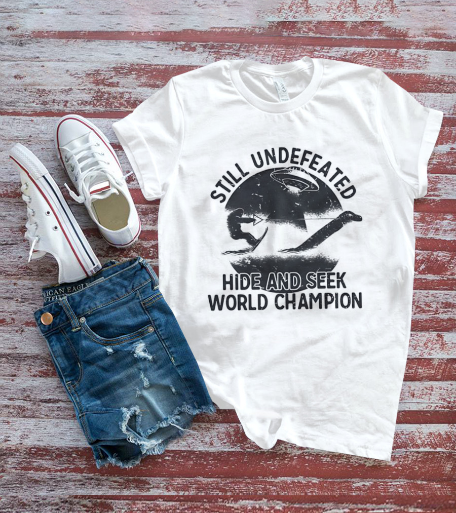 Still Undefeated Hide And Seek World Champion Bigfoot Riding Loch Ness Monster T-Shirt