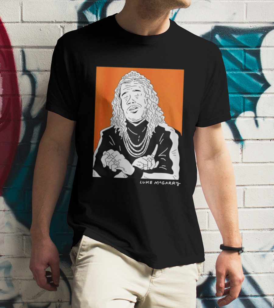 Luke McGarry Cartoon Character With Long Hair And Chains On Orange T-Shirt