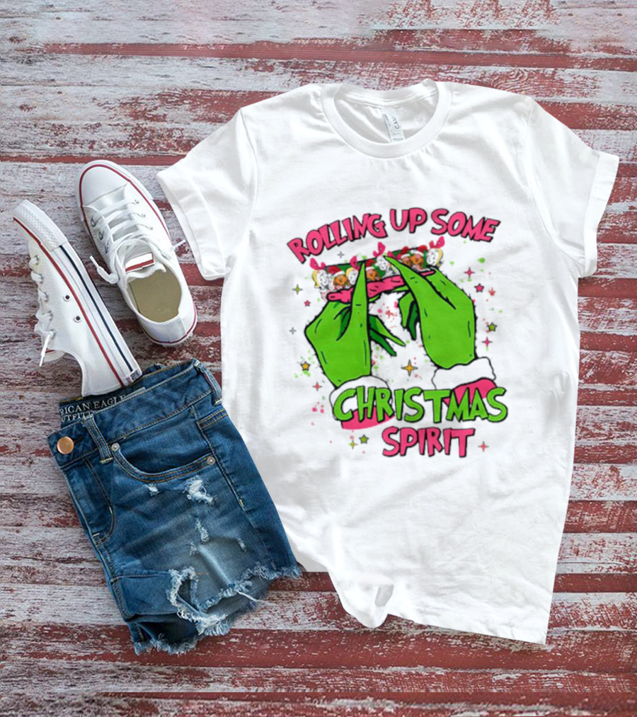 Grinch Rolling Up Some Christmas Spirit With Green Hands And Glitter Stars T-Shirt