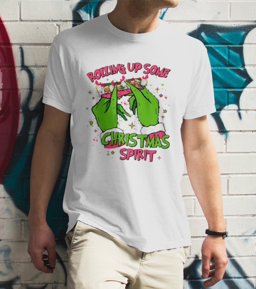 Grinch Rolling Up Some Christmas Spirit With Green Hands And Glitter Stars T-Shirt