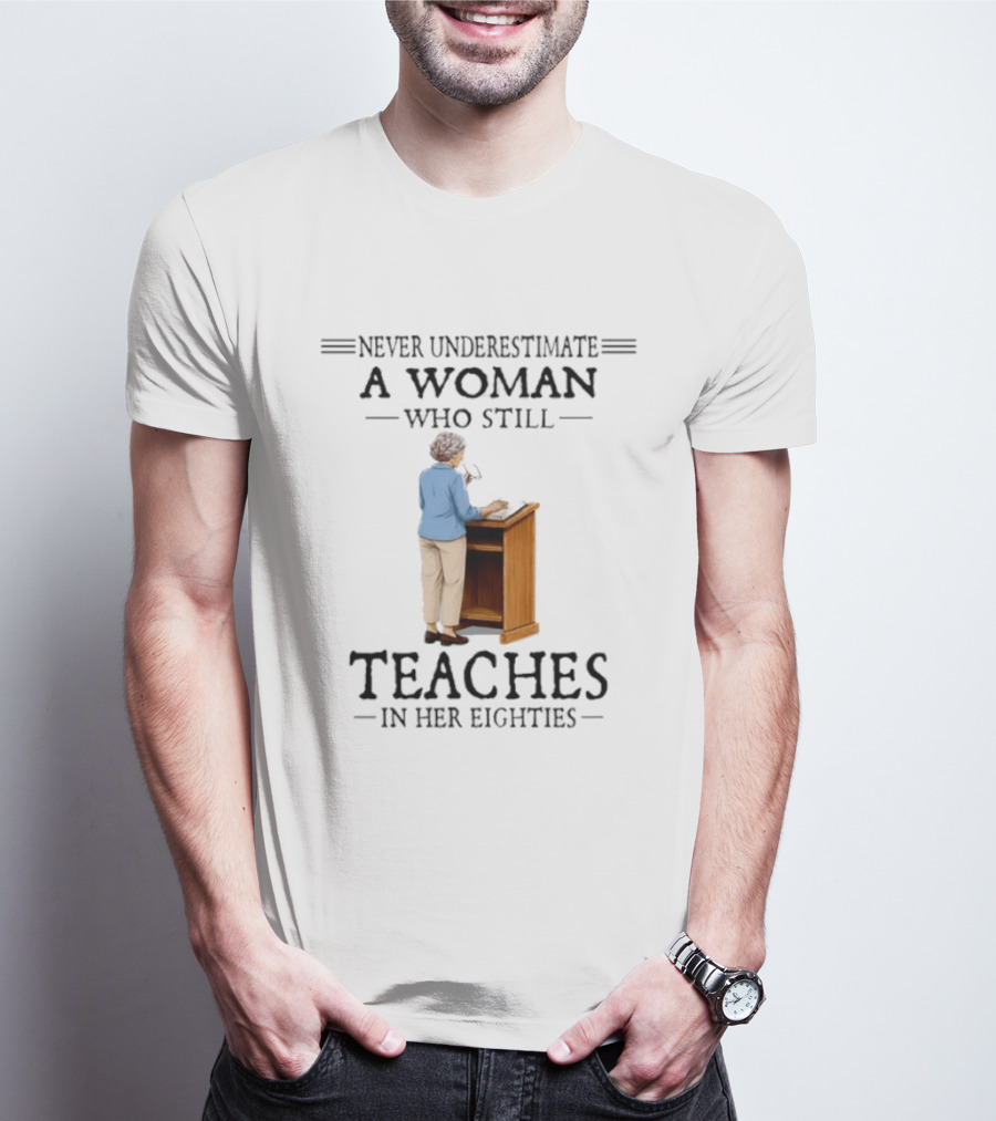 Never Underestimate A Woman Who Still Teaches In Her Eighties 2026 T-Shirt