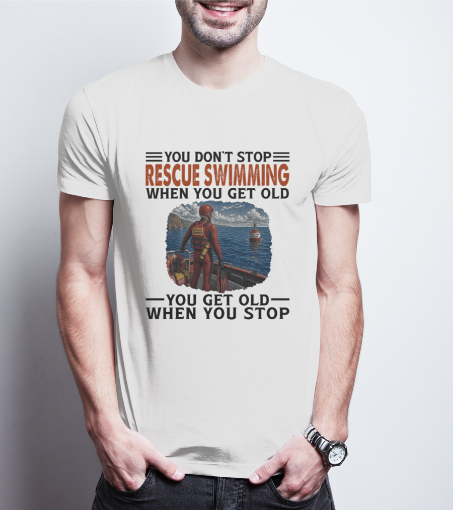 You Don't Stop Rescue Swimming When You Get Old You Get Old When You Stop Rescue Swimmer Standing On Boat Near Lighthouse T-Shirt