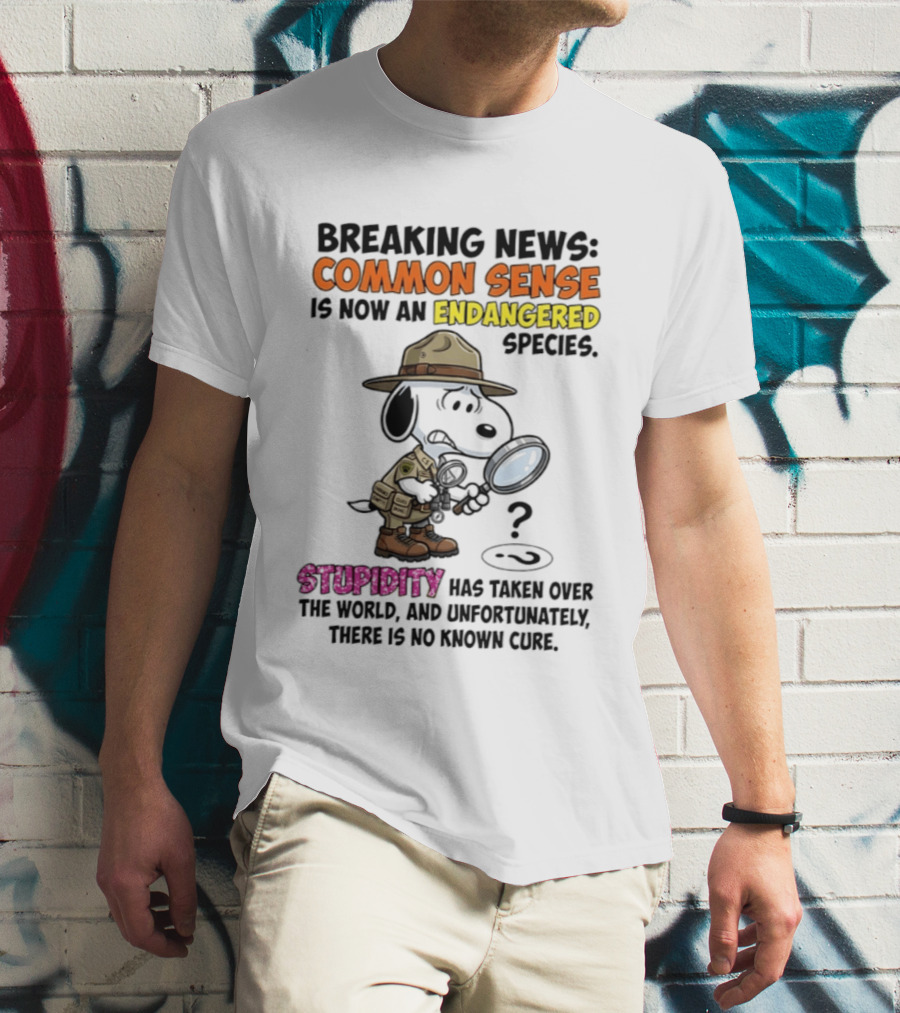 Breaking News Common Sense Endangered Species Stupidity Taken Over Snoopy T-Shirt