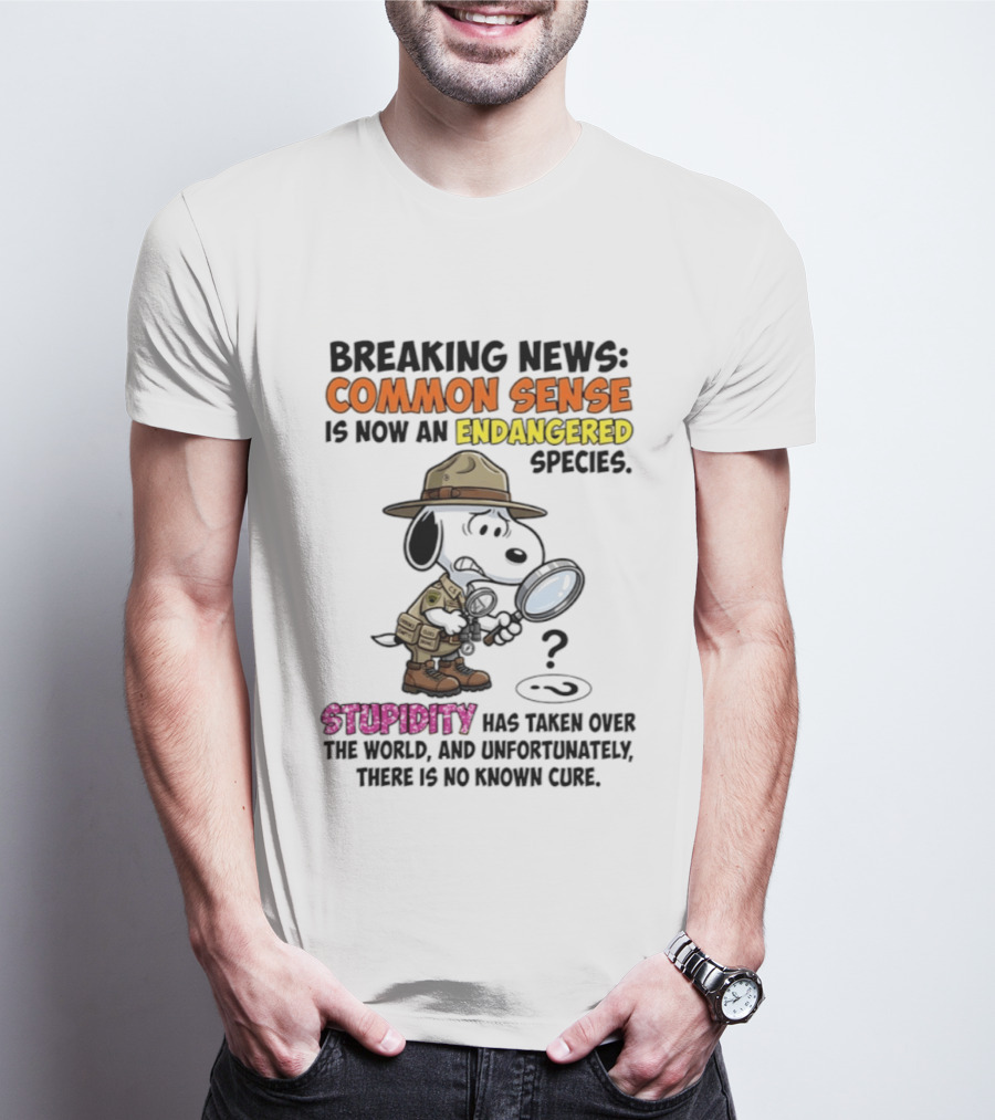 Breaking News Common Sense Endangered Species Stupidity Taken Over Snoopy T-Shirt