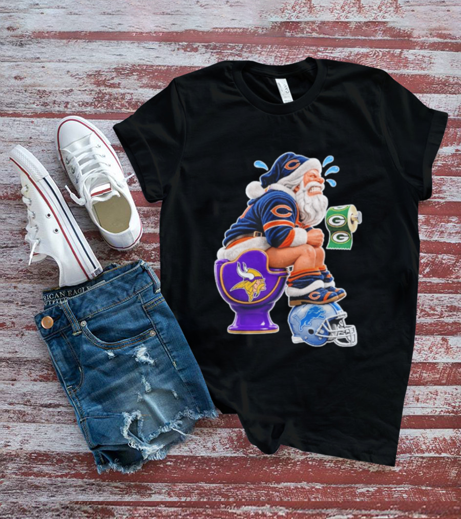 Santa Claus On Toilet Minnesota Vikings Detroit Lions Green Bay Packers Chicago Bears Funny Christmas 2026 Football T-Shirt