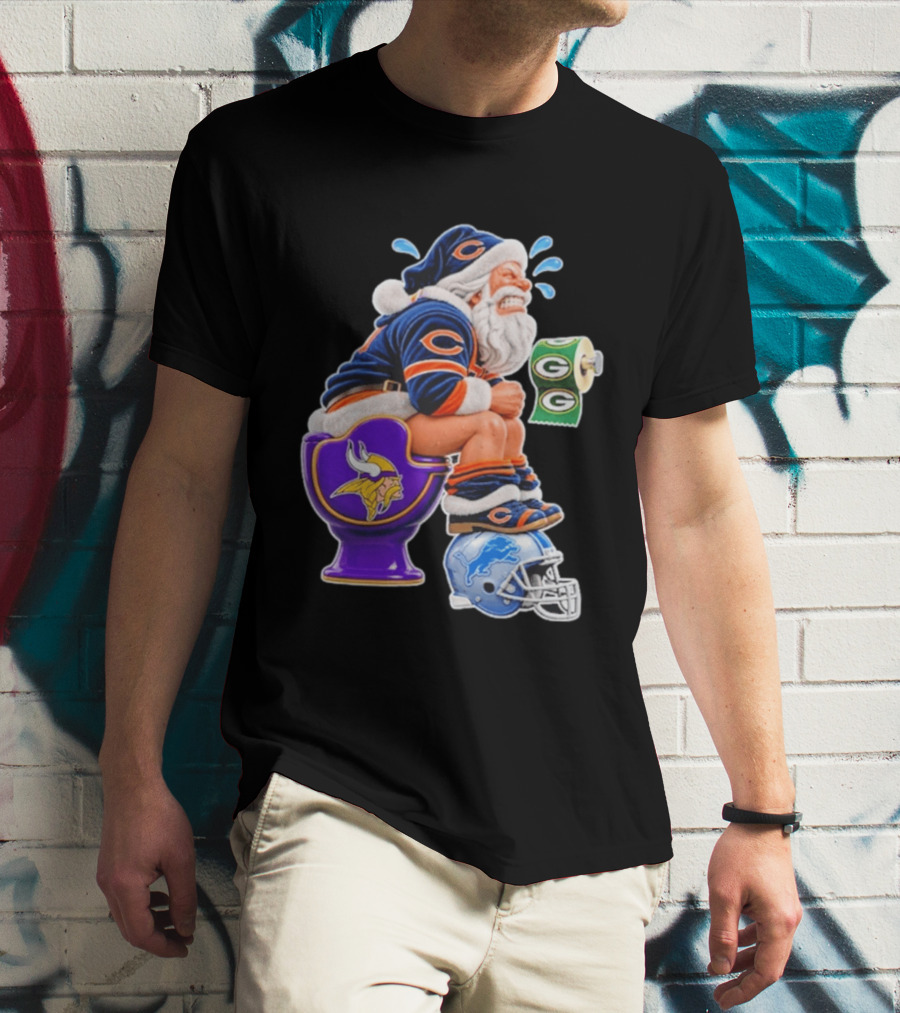 Santa Claus On Toilet Minnesota Vikings Detroit Lions Green Bay Packers Chicago Bears Funny Christmas 2026 Football T-Shirt