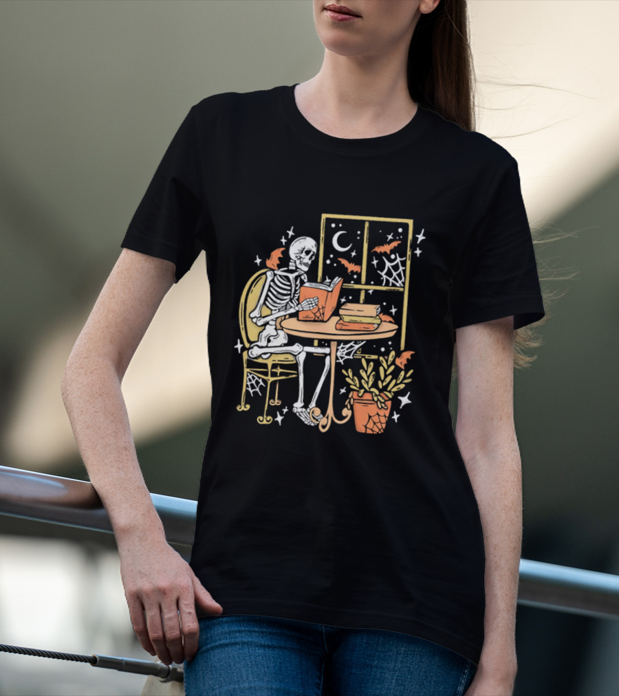 Cartoon Skeleton Reading Under Crescent Moon With Bats Orange Book Table Window T-Shirt