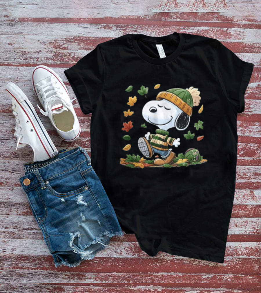 Milwaukee Bucks Snoopy In Beanie Walking Through Autumn Leaves Cartoon T-Shirt