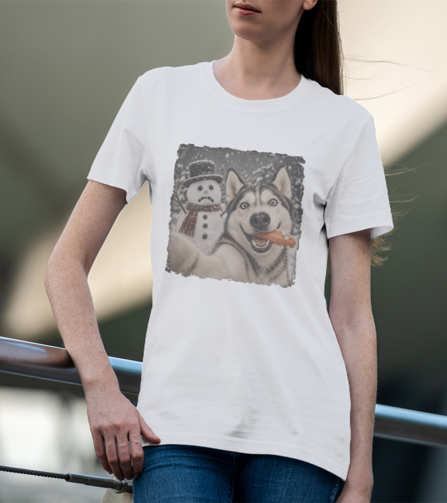A Sled Dog With A Carrot And A Sad Snowman In A Snowy Winter Scene T-Shirt