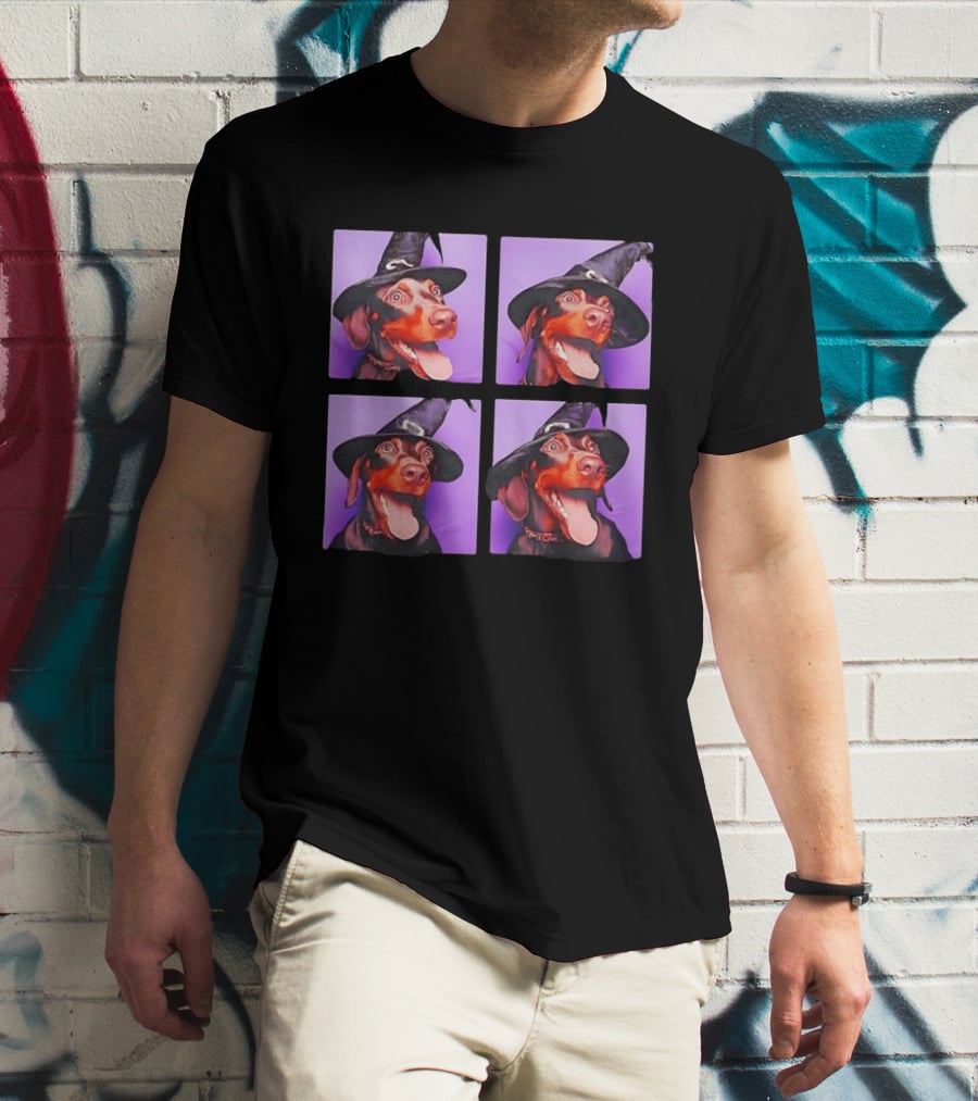 Doberman Pinscher In Witch Hat For Halloween With Purple T-Shirt