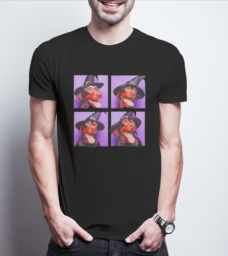 Doberman Pinscher In Witch Hat For Halloween With Purple T-Shirt