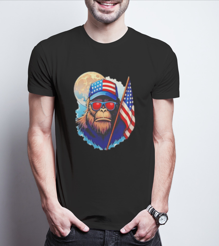 Bigfoot USA Flag Hat Sunglasses Patriotic Moon Background T-Shirt