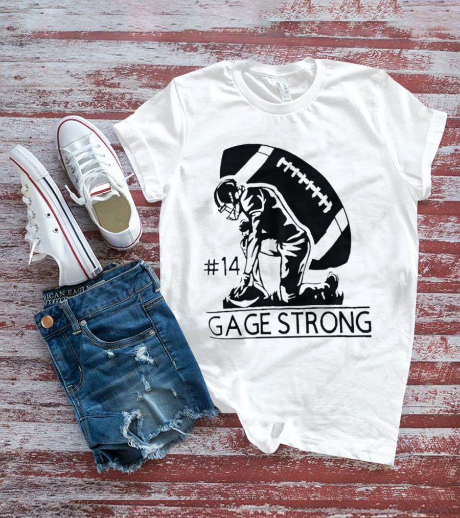 Gage Strong #14 Football Player Kneeling In Front Of Large Football T-Shirt