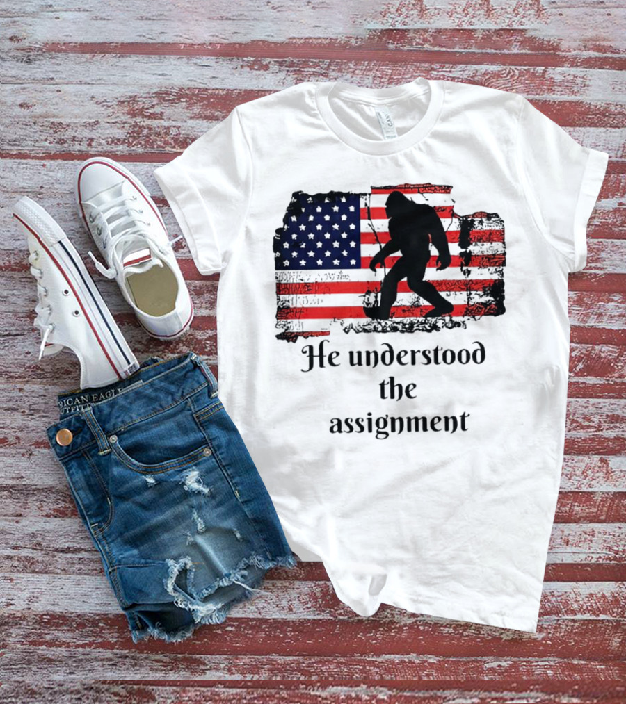 Bigfoot Silhouette With Distressed American Flag He Understood The Assignment T-Shirt