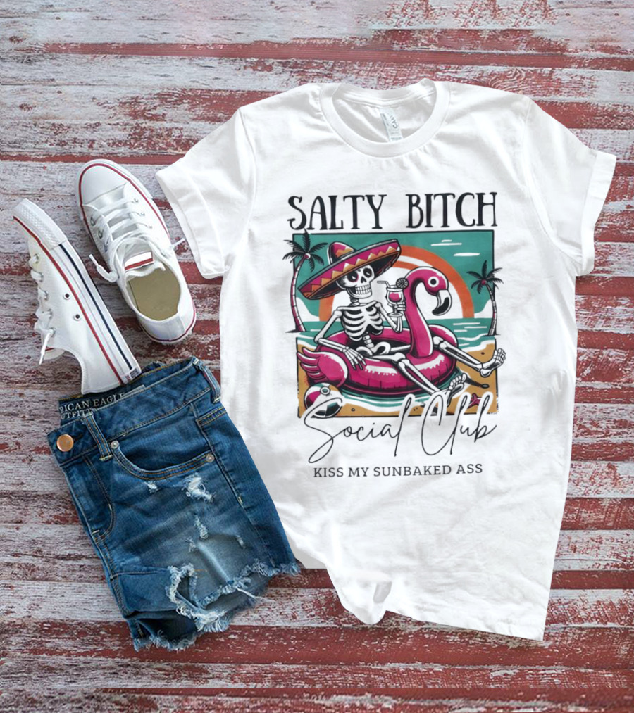Salty Bitch Skeleton On Flamingo Float In Sunset Beach Scene With Kiss My Sunbaked Ass Text T-Shirt