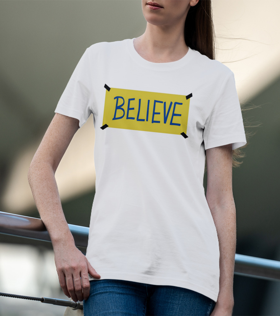 Ted Lasso Believe Sign Taped Yellow Background T-Shirt