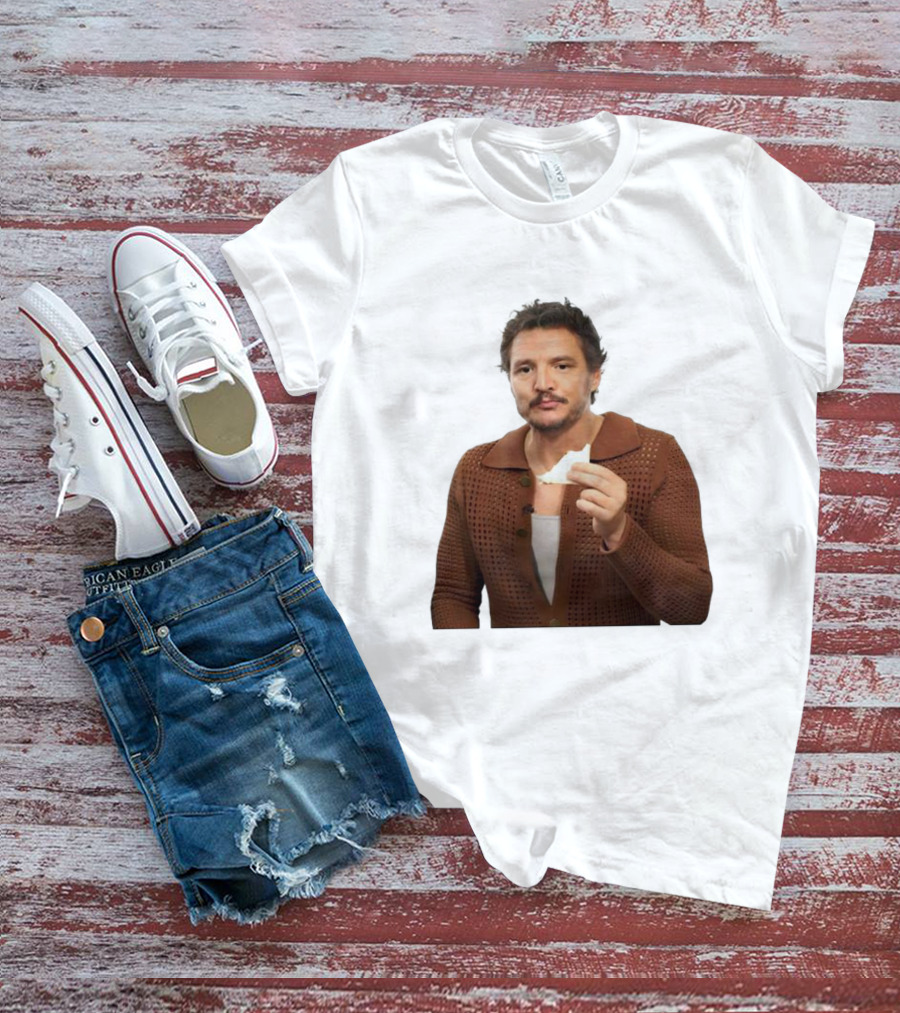 Pedro Pascal Holding Sandwich In Brown T-Shirt