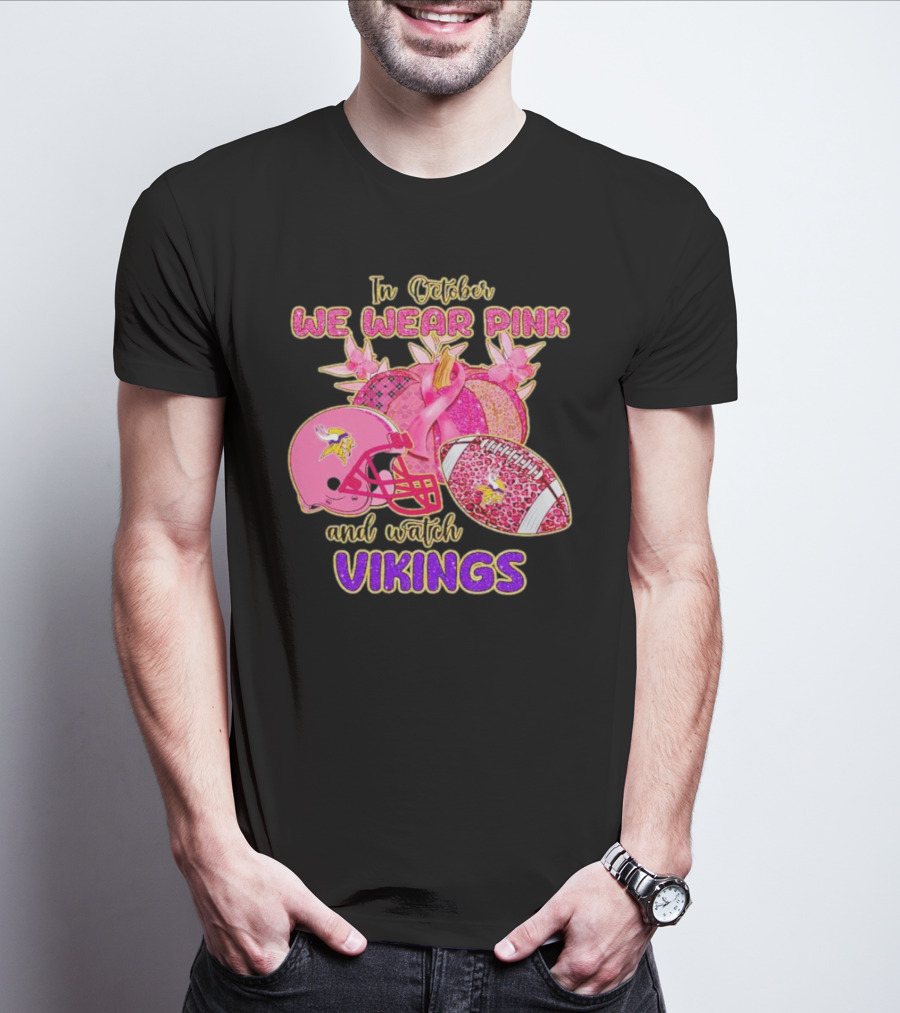 In October We Wear Pink And Watch Vikings Football Helmets Breast Cancer Awareness T-Shirt