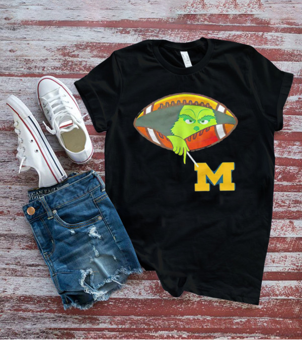Grinch Peeking From Football Over Michigan Wolverines T-Shirt