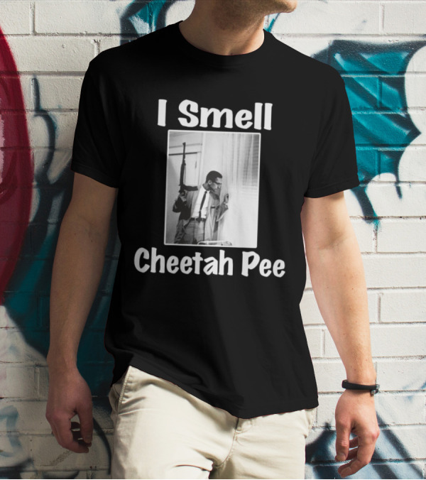 I Smell Cheetah Pee Man Holding Gun By Window T-Shirt
