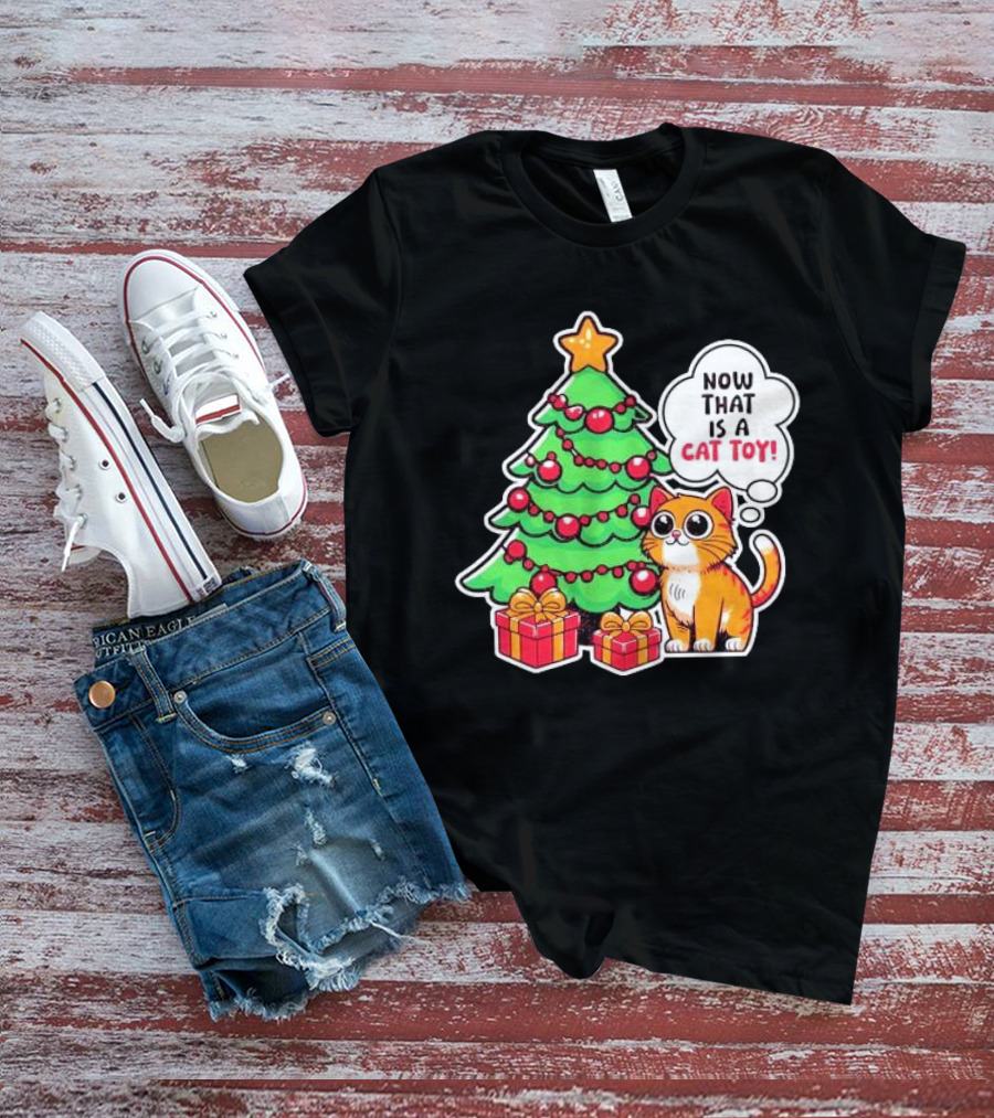 Now That Is A Cat Toy A Cute Orange Cat With Wide Eyes Next To Decorated Christmas Tree T-Shirt