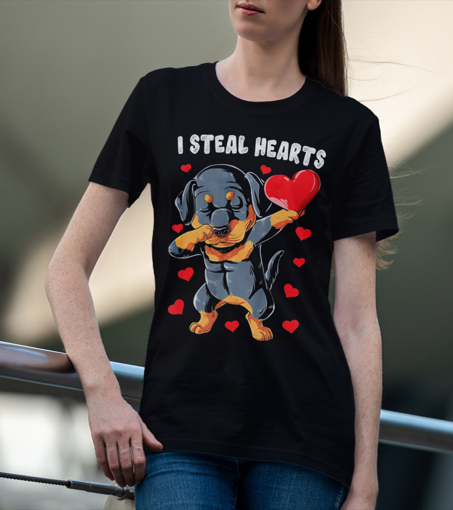 Dabbing Rottweiler Holding Heart Surrounded By I Steal Hearts Text T-Shirt