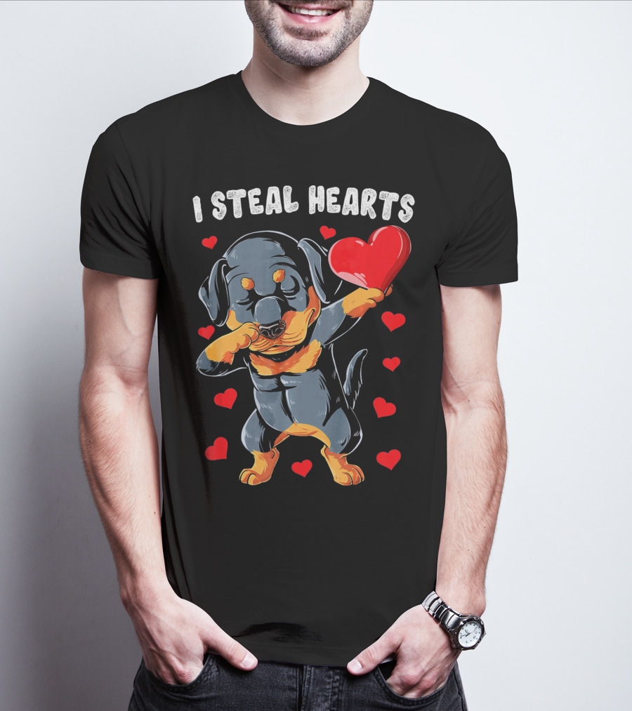 Dabbing Rottweiler Holding Heart Surrounded By I Steal Hearts Text T-Shirt