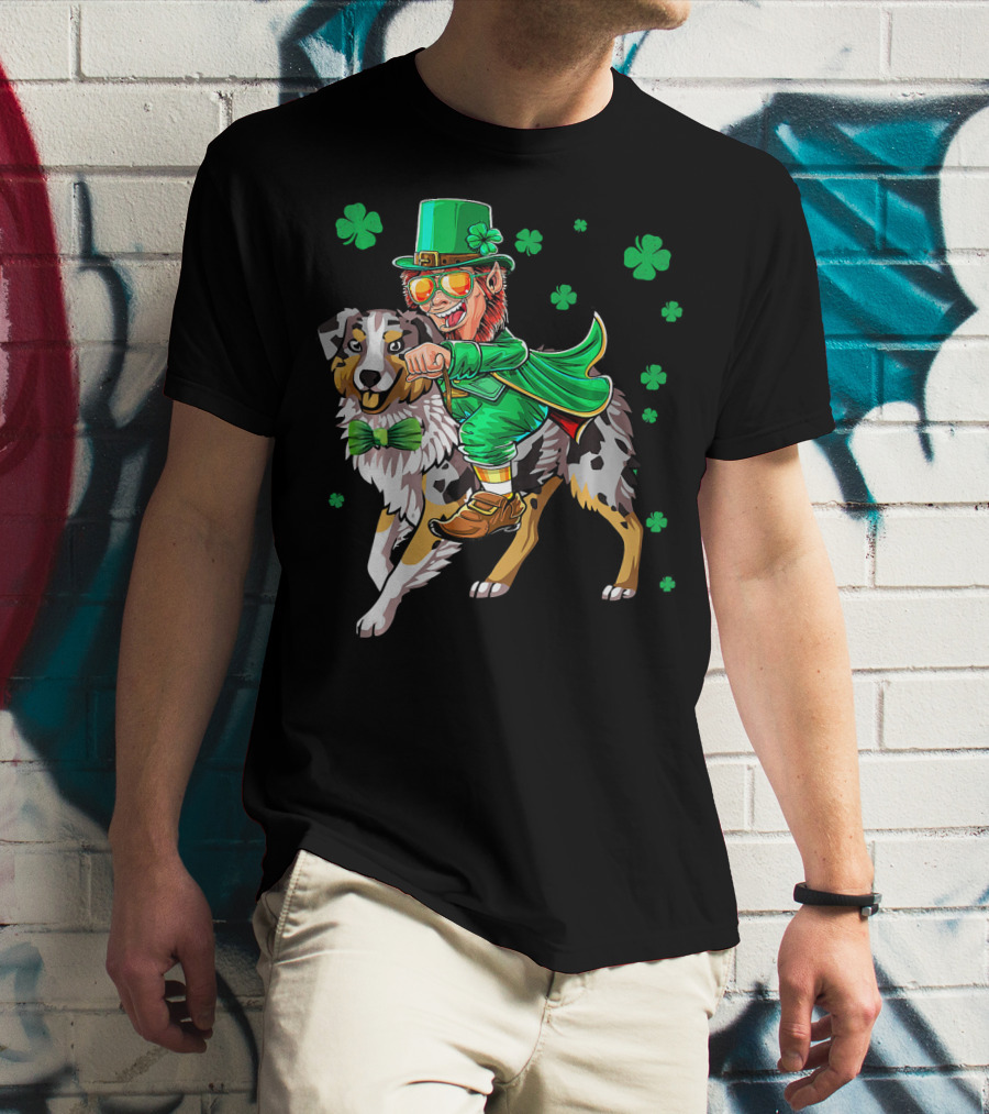 Leprechaun Riding Australian Shepherd With Shamrock Bow Tie And Clover Background T-Shirt