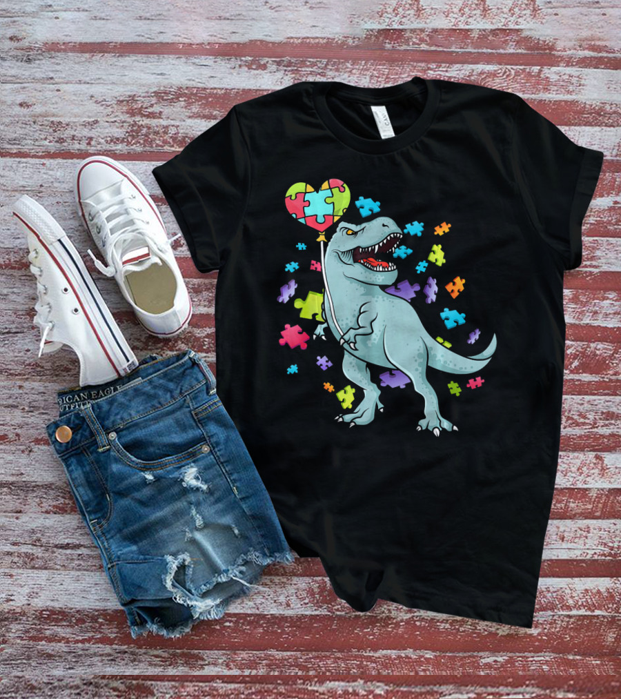 Autism Awareness Dinosaur With Puzzle Heart Balloon And Colorful Puzzle Pieces T-Shirt
