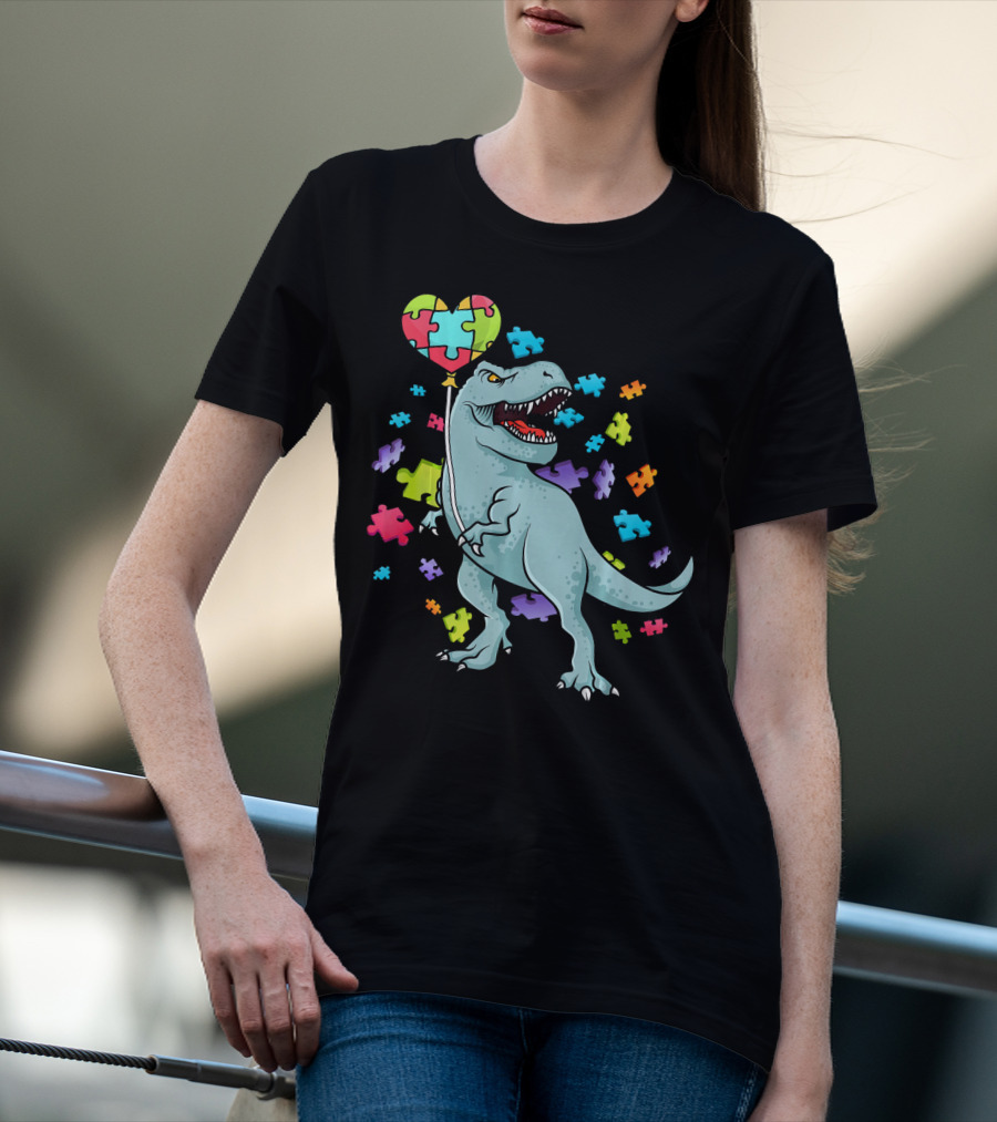 Autism Awareness Dinosaur With Puzzle Heart Balloon And Colorful Puzzle Pieces T-Shirt