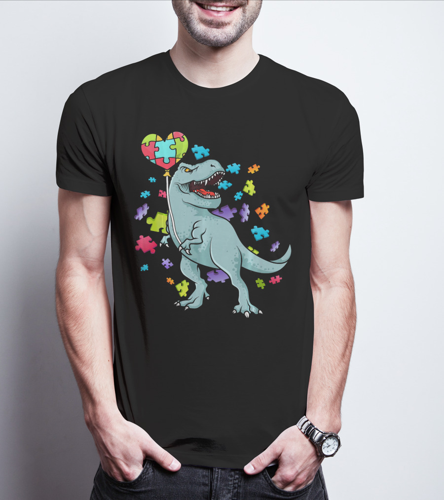 Autism Awareness Dinosaur With Puzzle Heart Balloon And Colorful Puzzle Pieces T-Shirt