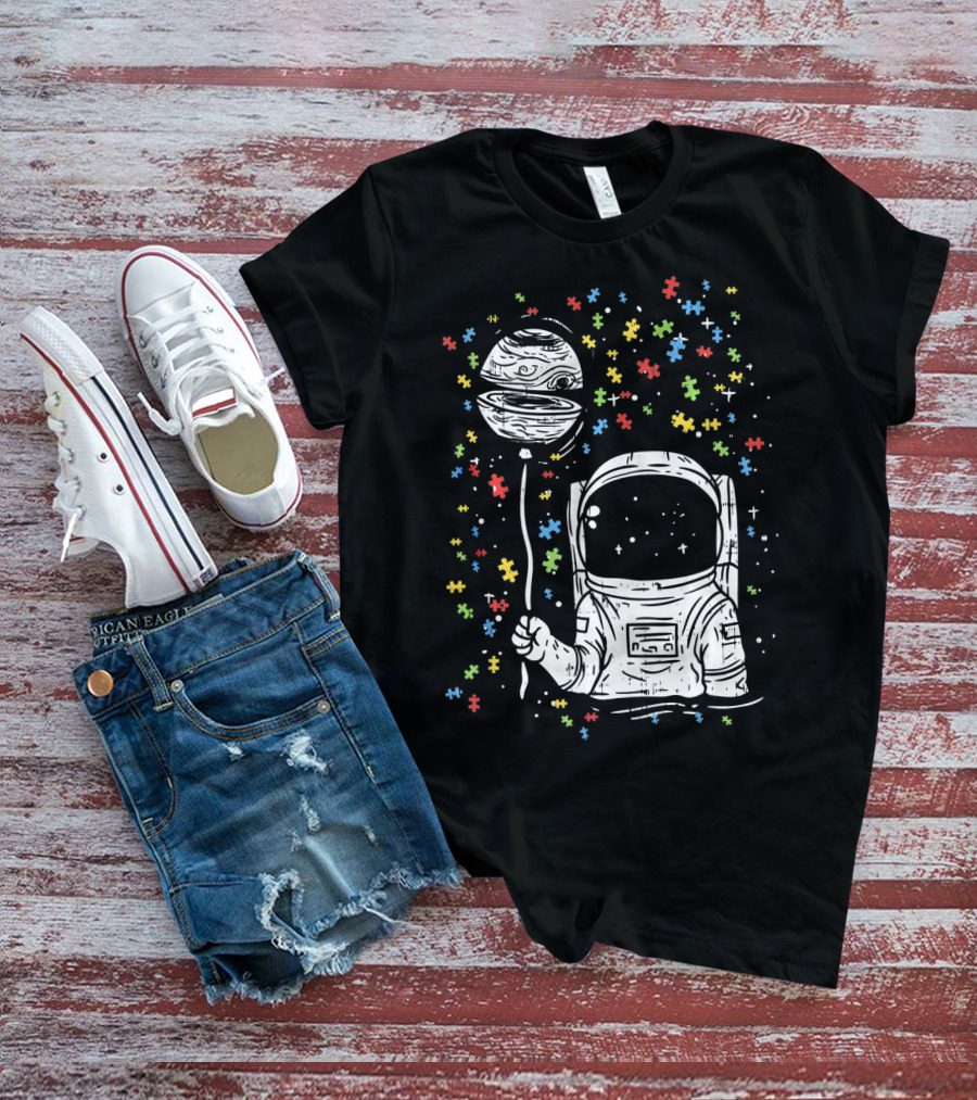 Astronaut Holding Planet Balloon With Puzzle Pieces For Autism Awareness T-Shirt
